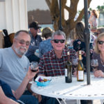 men with wine