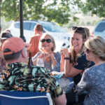 people laughing at table
