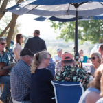 people on patio at tables