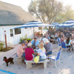 guest at tables for live music