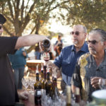 wine pouring with guests